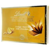 Шоколад молочный Lindt со вкусом апельсина в тонких пластинках 125г